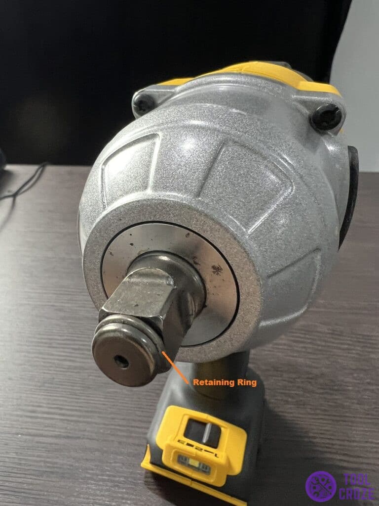 Impact wrench retaining ring used to hold a socket