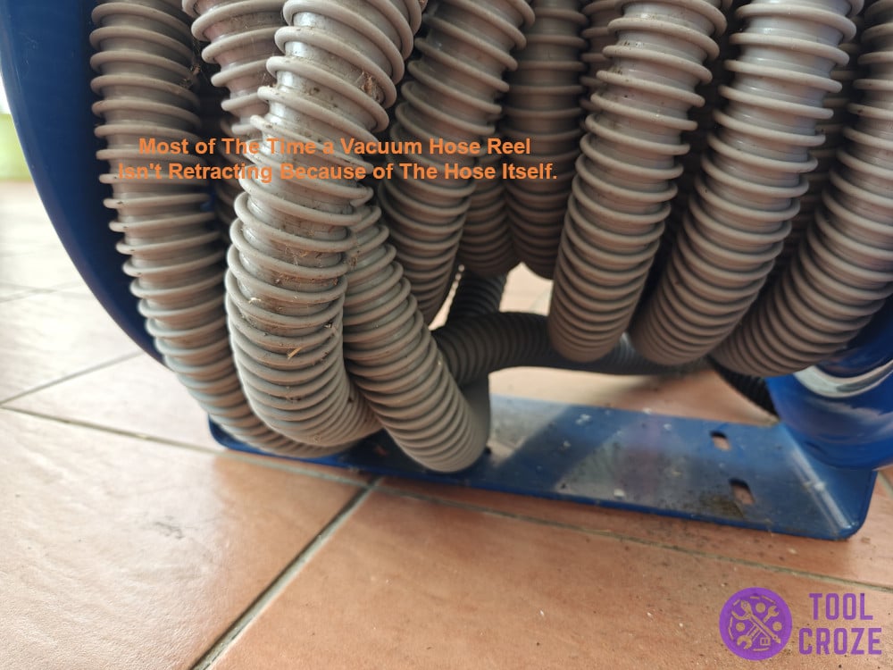 Most of the time a vacuum hose reel isn't retracting because of the hose itself.