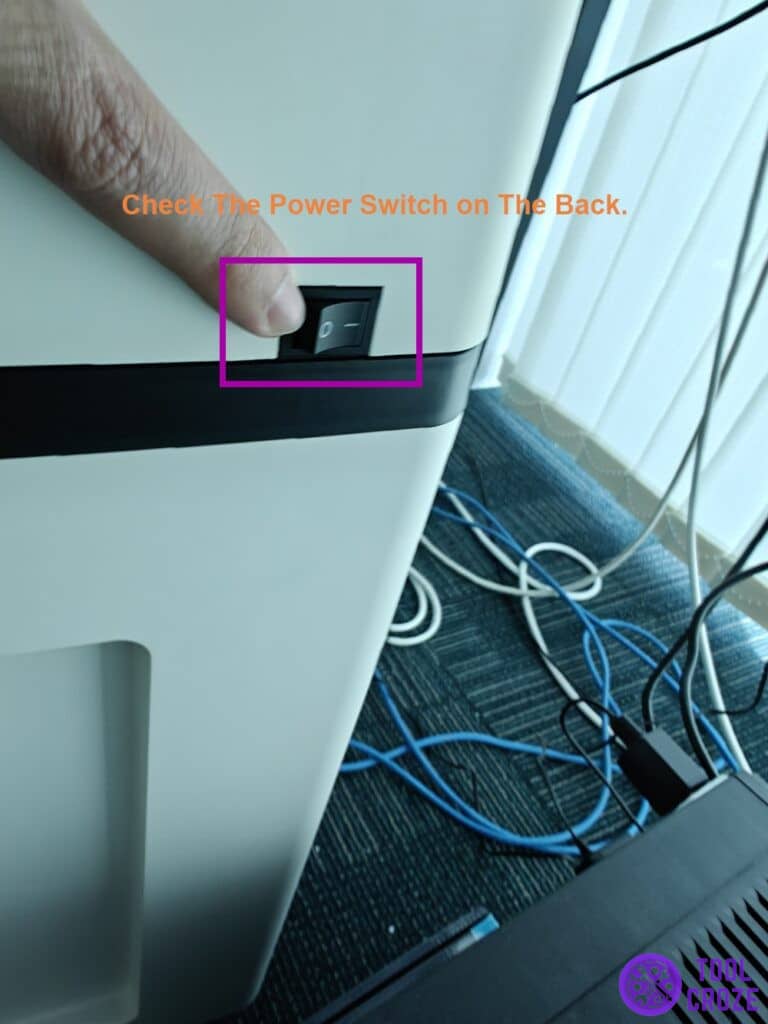 checking the power switch on the back