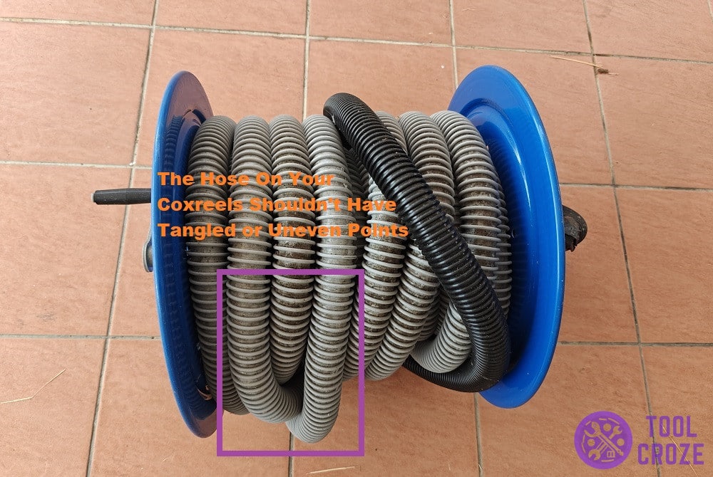 do not wrap the hose unevenly around the coxreel