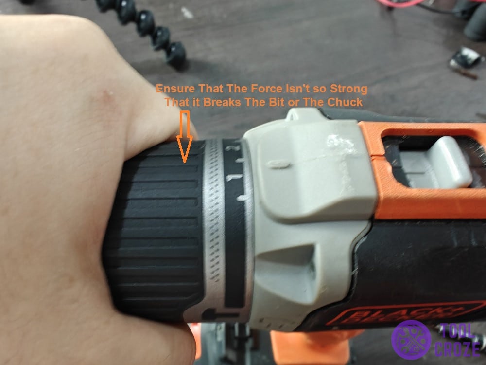 ensure that the force isn't so strong that it breaks the bit or the chuck