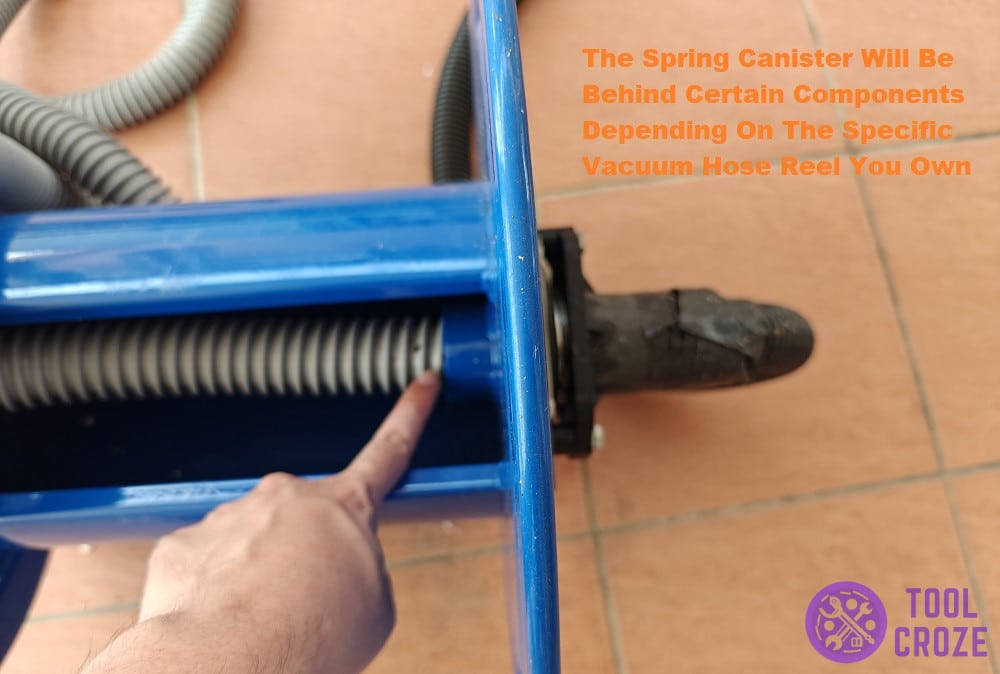 remove components and replace spring canister on coxreel