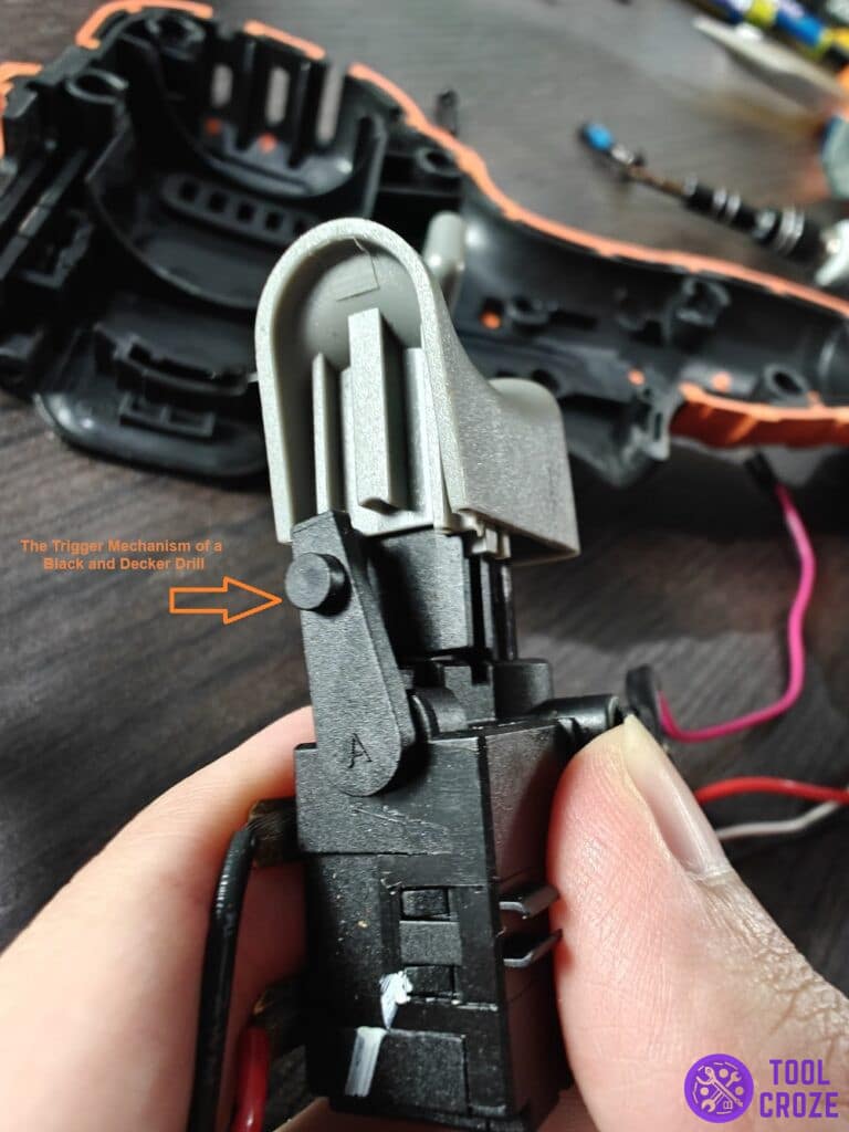 the trigger mechanism of a Black and Decker drill