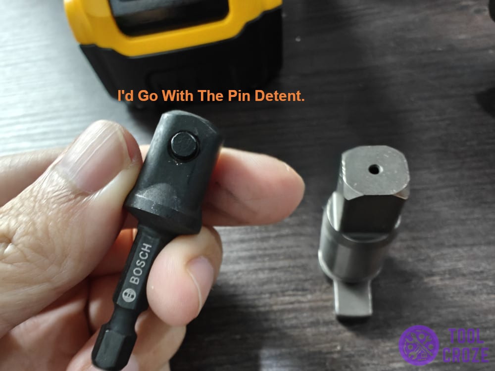 I'd go with the pin detent.