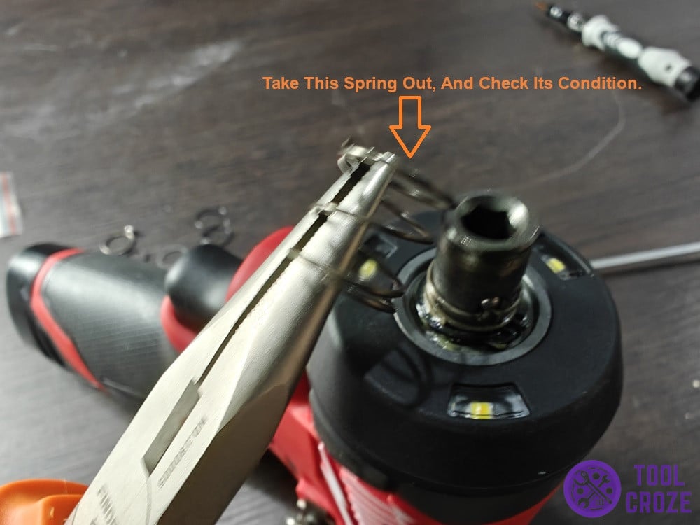 Take this spring out, and check its condition.