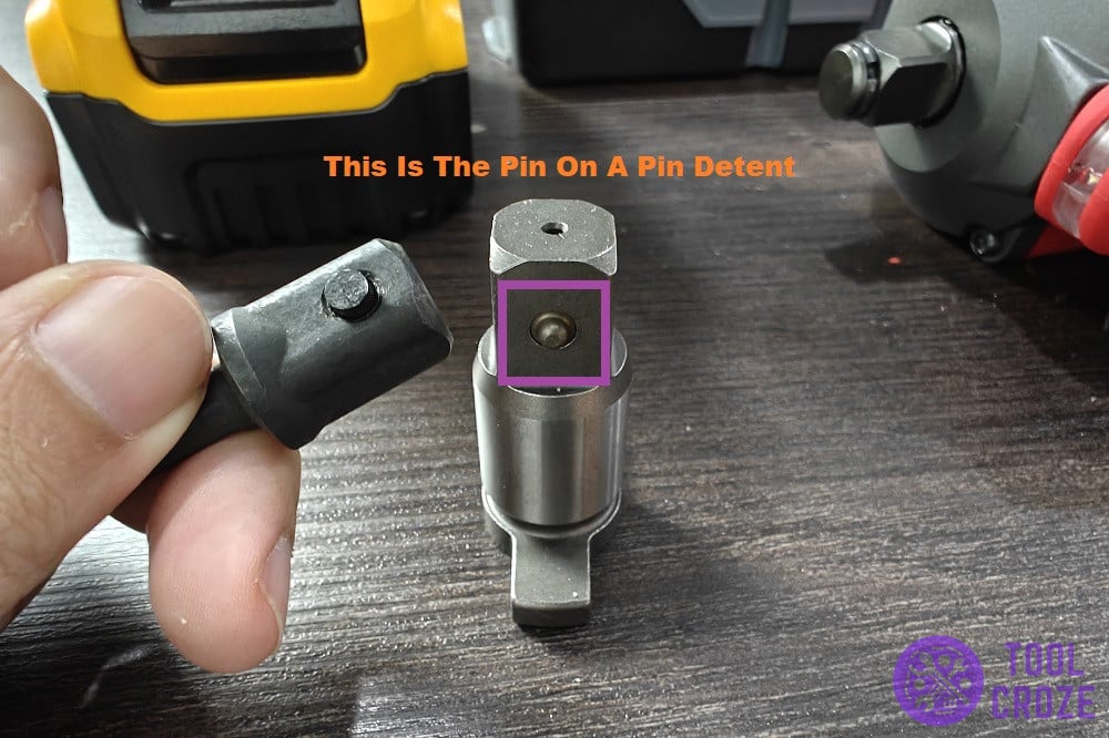 hog ring and pin detent together