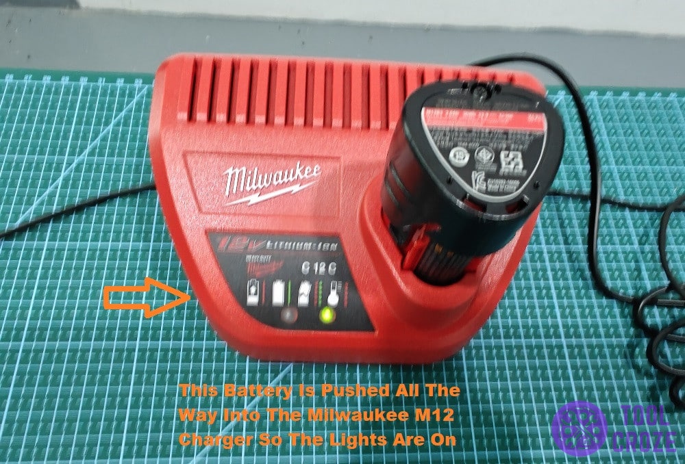 push the battery fully into the milwaukee charger
