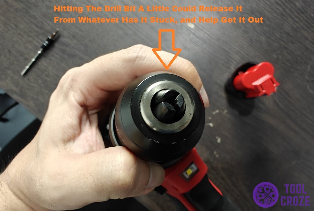 try loosening the bit by smacking