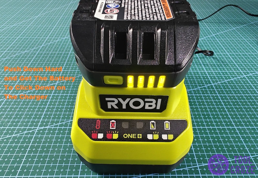 push down hard on the ryobi battery while nserting into charger