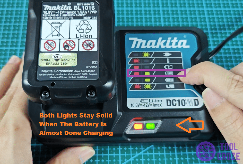 solid red and green light on makita charger