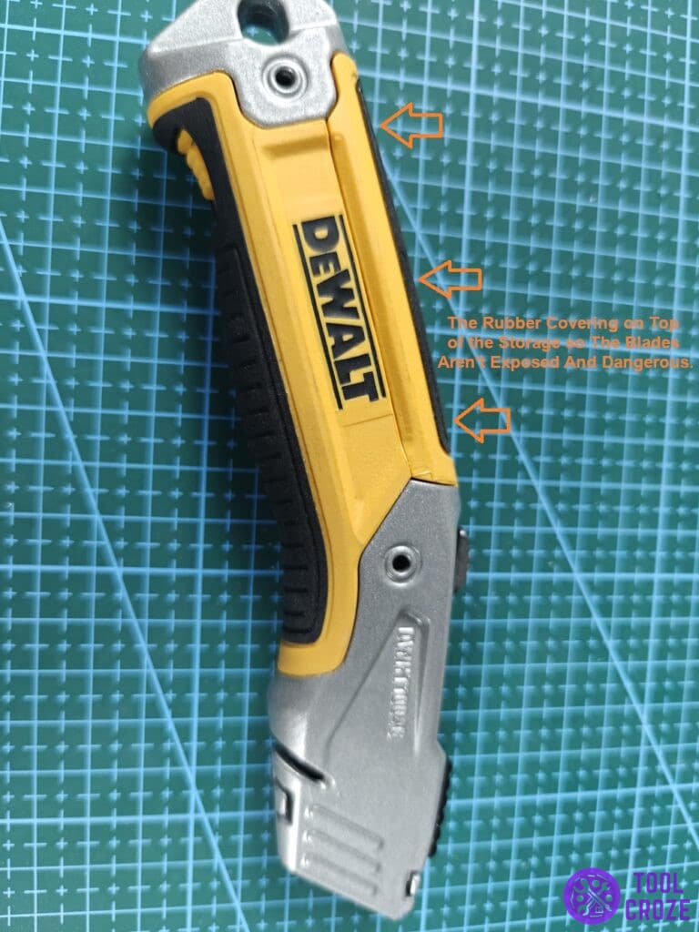 The rubber covering on top of the storage of the blades