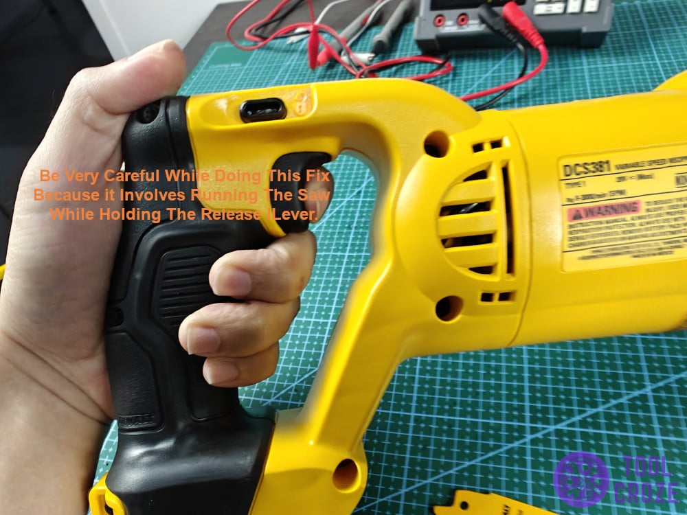 This fix involves running the saw while holding the release lever.