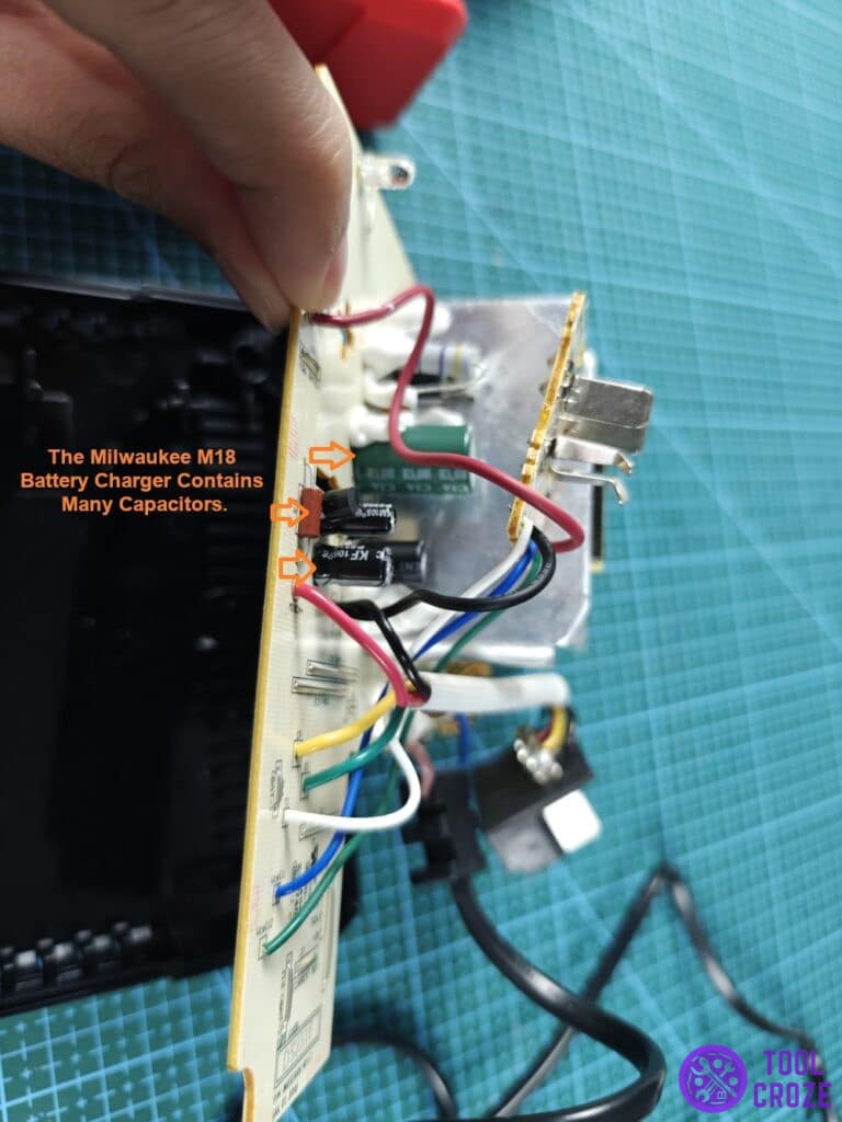 capacitors inside a Milwaukee M18 battery charger