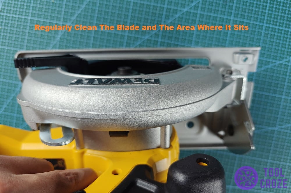 clean the blade and area surrounding it