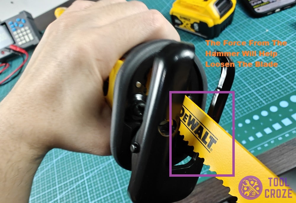 holding dewalt reciprocating saw upside down