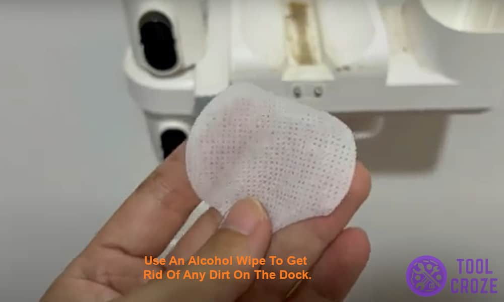 Use an alcohol wipe to get rid of any dirt on the dock.