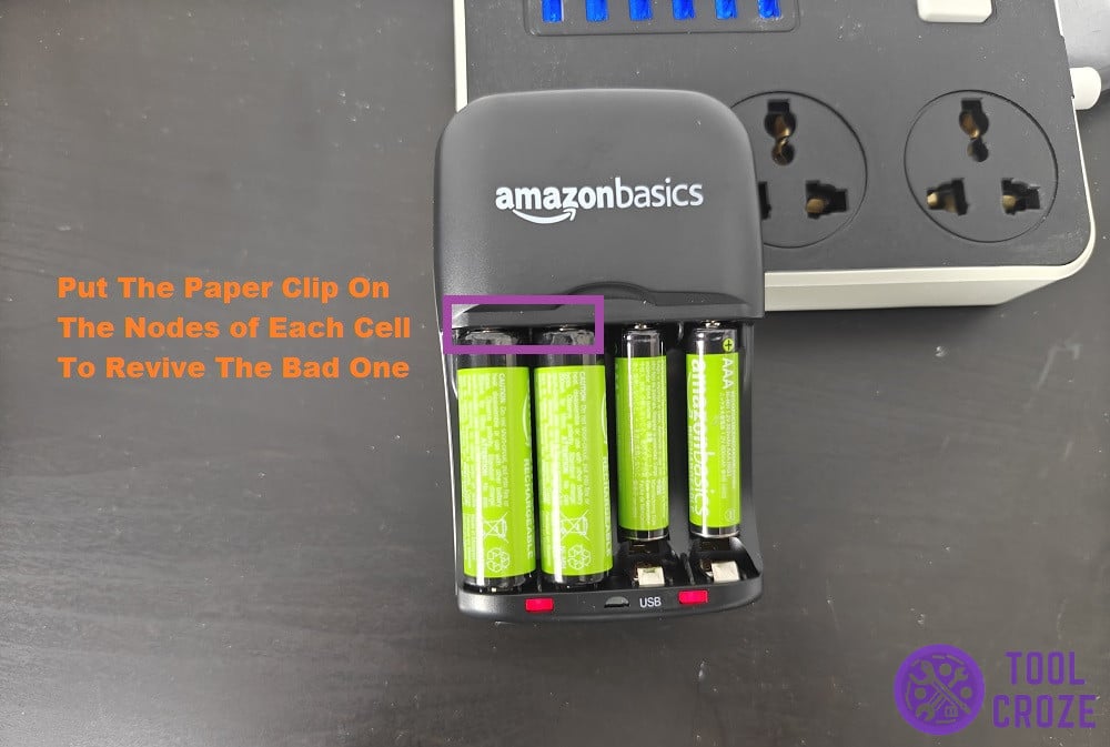 use paper clip method to revive dead battery