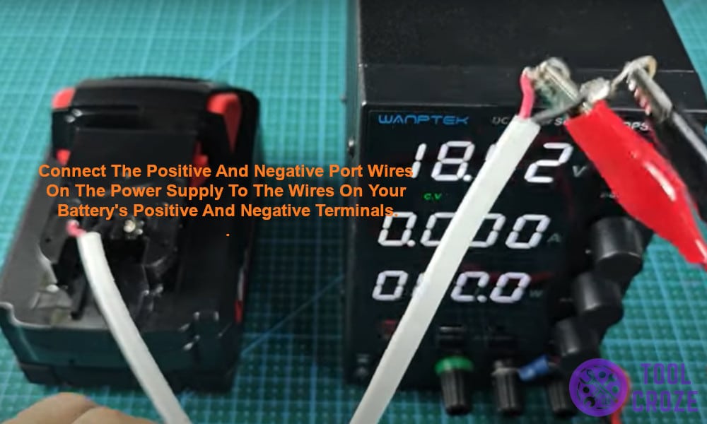 Connect the positive and negative terminals of the battery and the DC power supply