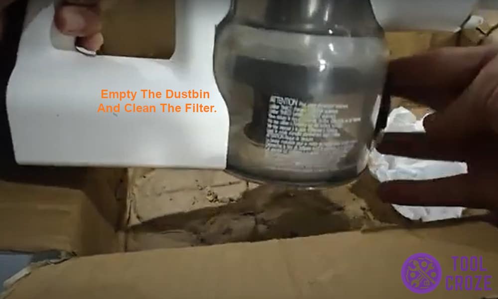 Empty the dustbin and clean the filter.