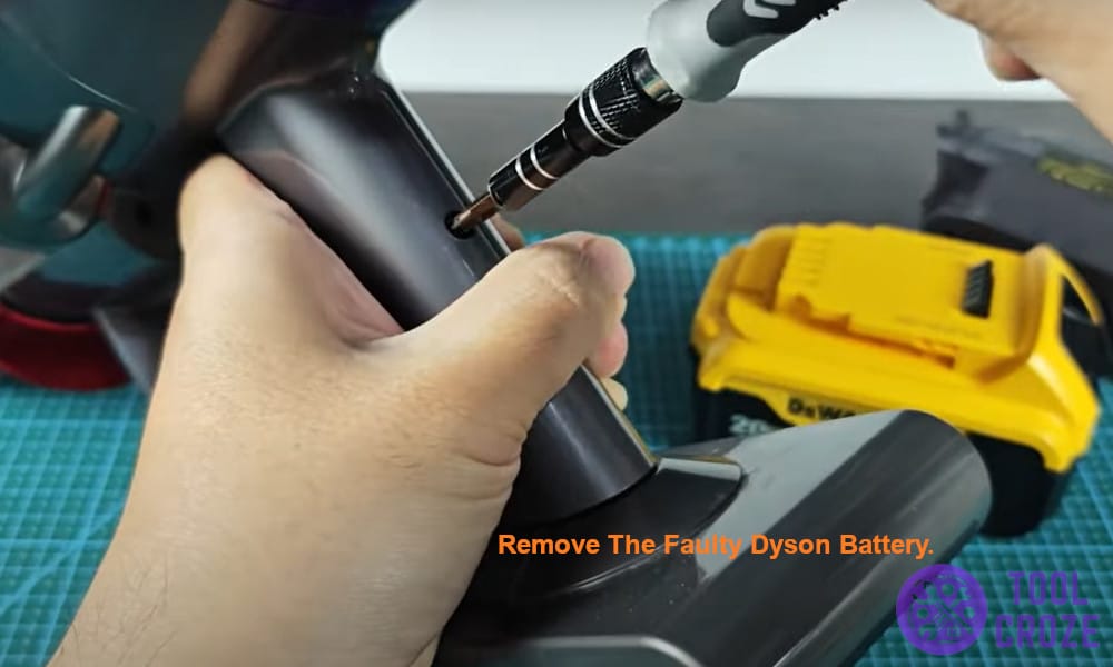 Remove the faulty Dyson battery.