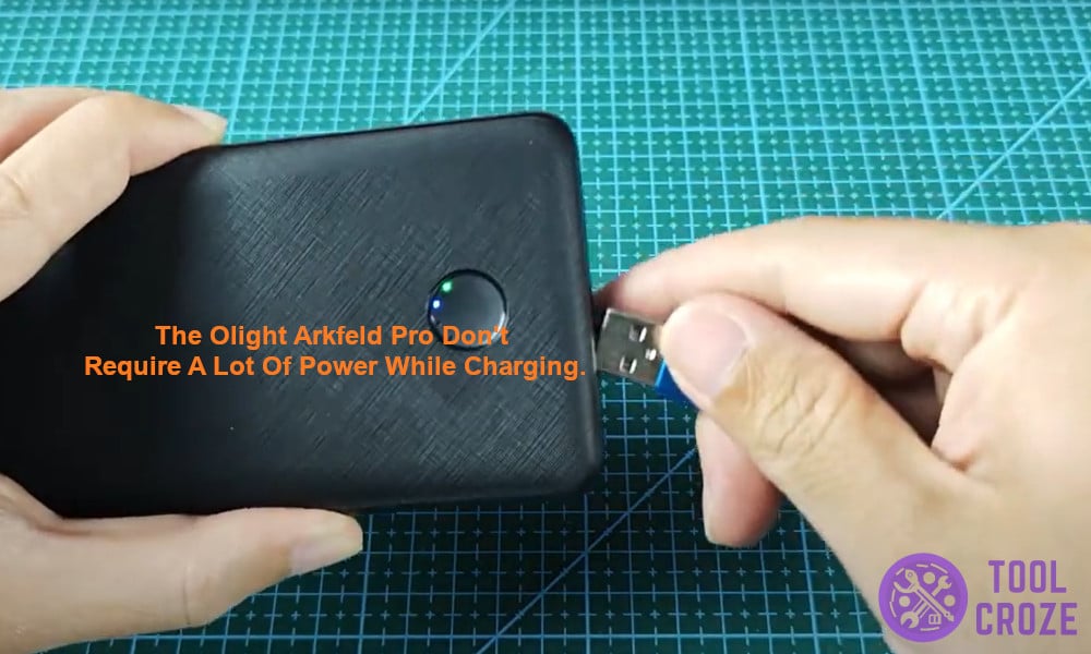 The Olight Arkfeld Pro don't require a lot of power while charging.