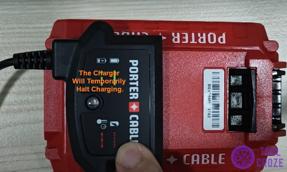 The charger will temporarily halt charging.