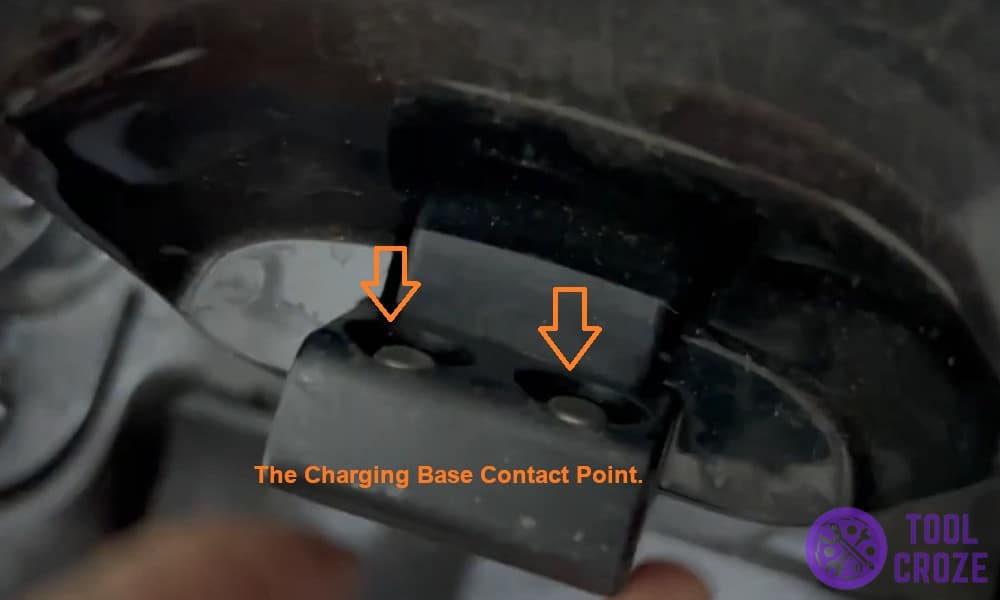 The charging base contact point.
