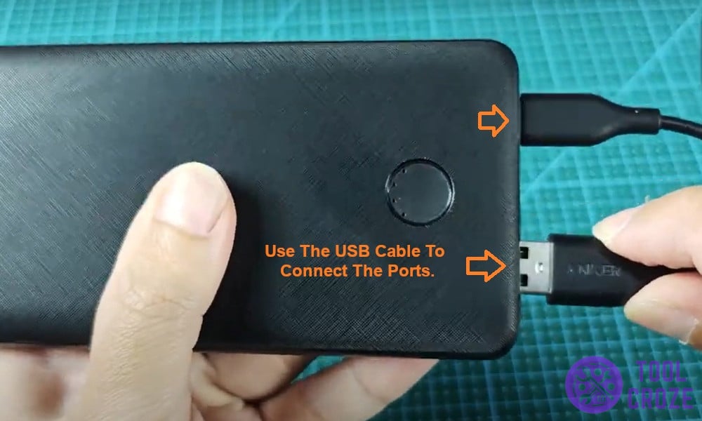 Use the USB cable to connect the ports.
