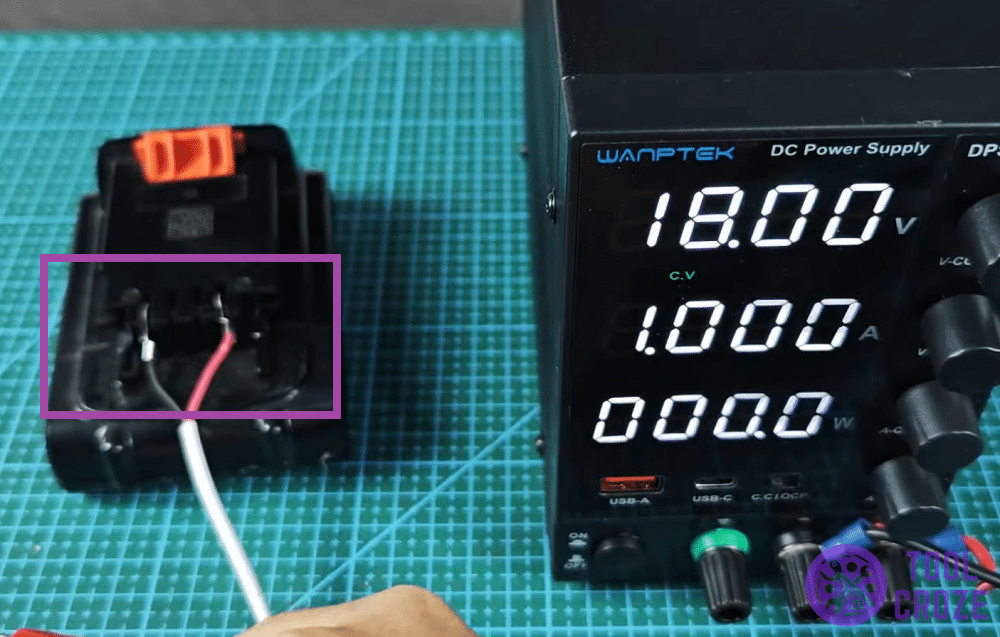 black and decker battery connected to power supply