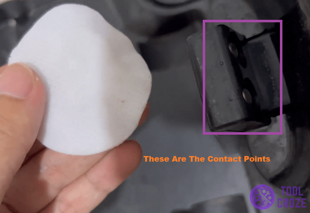clean the charging plate on the base too