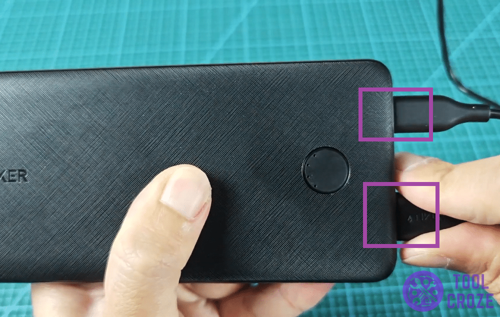 connect a cable to both ports of anker power bank