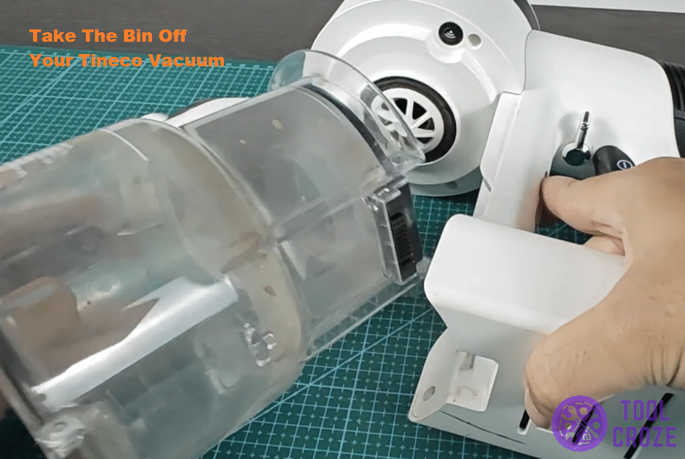 remove bin from tineco vacuum