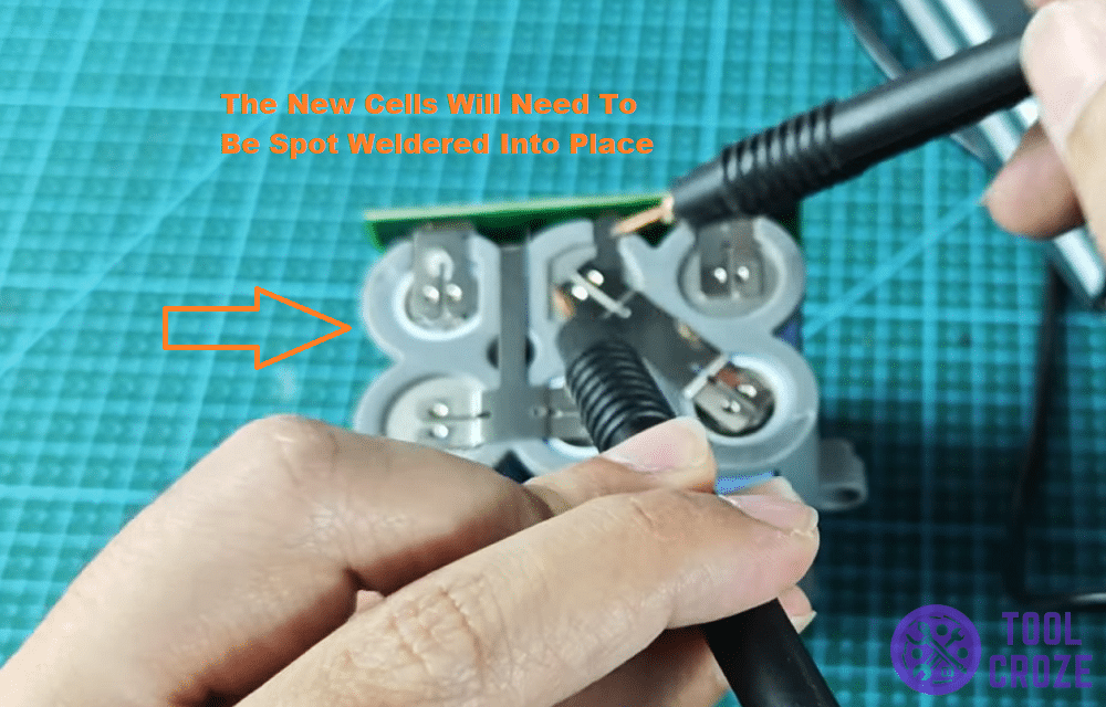 spot welding new cells into battery pack