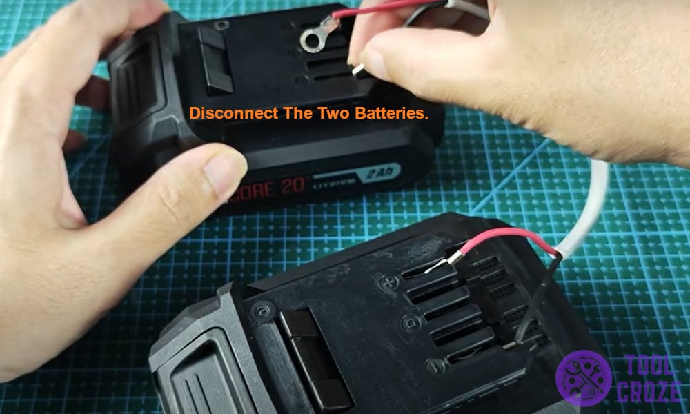 Disconnect the two batteries.