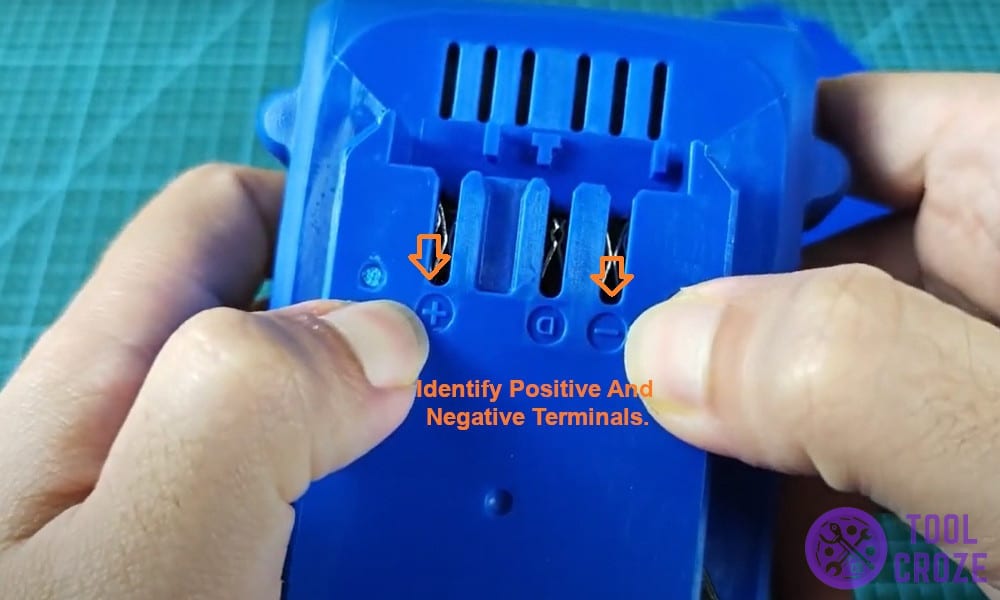 Identify positive and negative terminals.