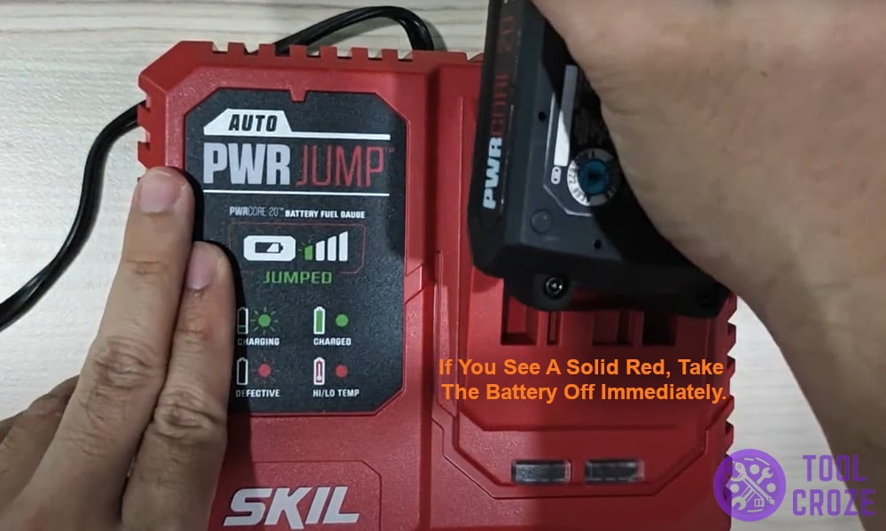If you see a solid red, take the battery off immediately.