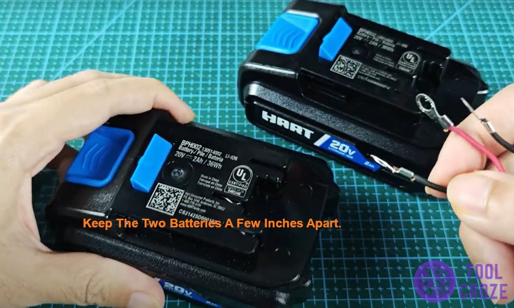 Keep the two batteries a few inches apart.
