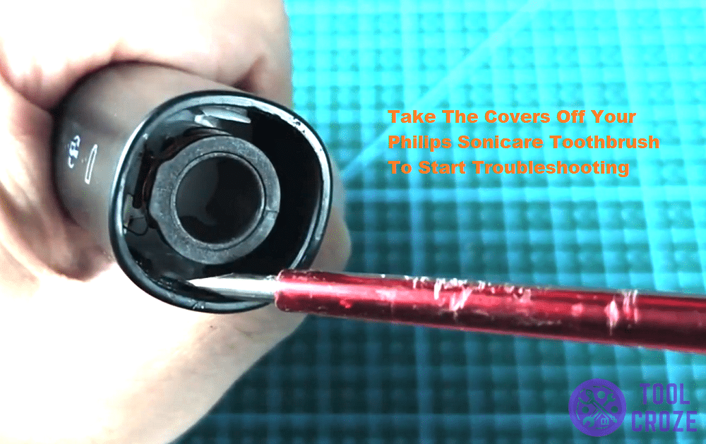 pry open the top of philips sonicare toothbrush