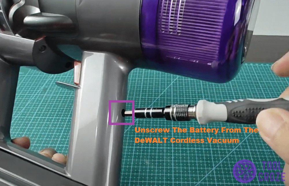 take off the screws around the dyson vacuum battery