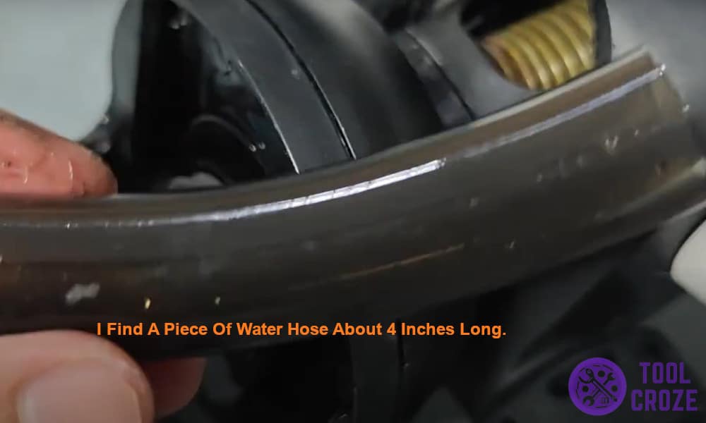 I find a piece of water hose 4 inches long.