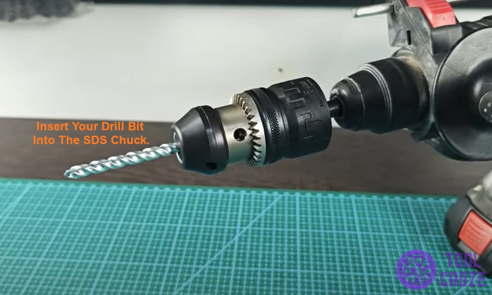 insert your drill bit into the SDS chuck.