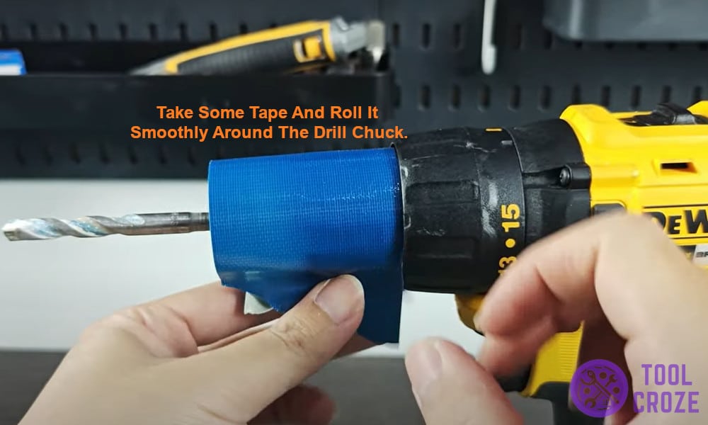 take some tape and roll it smoothly around the drill chuck.
