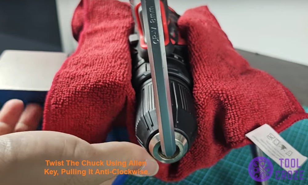 twist the chuck using allen key, pulling it anti-clockwise.