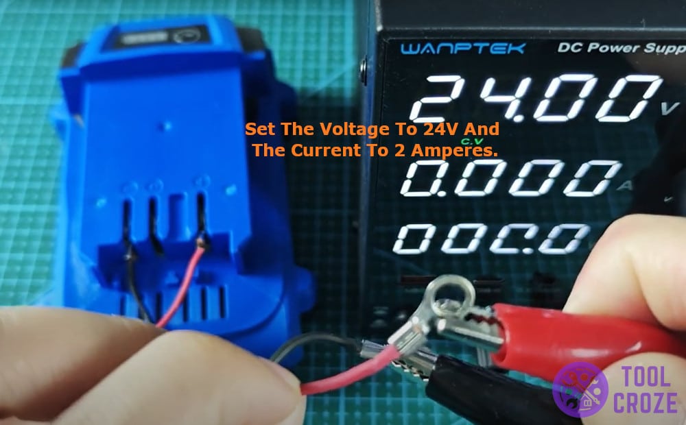 Set the voltage to 24V and the current to 2 amperes.