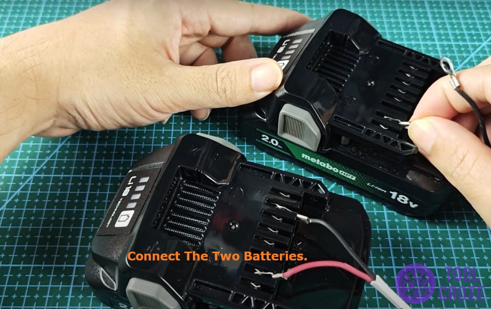 connect the two batteries.