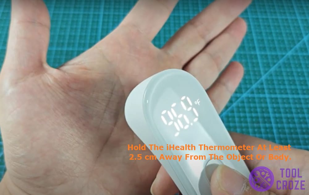 hold the iHealth thermometer at least 2.5 cm away from the object or body.
