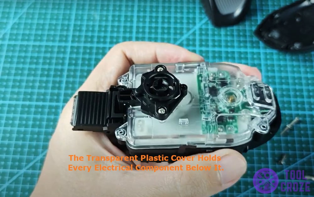 the transparent plastic cover holds every electrical component below it.