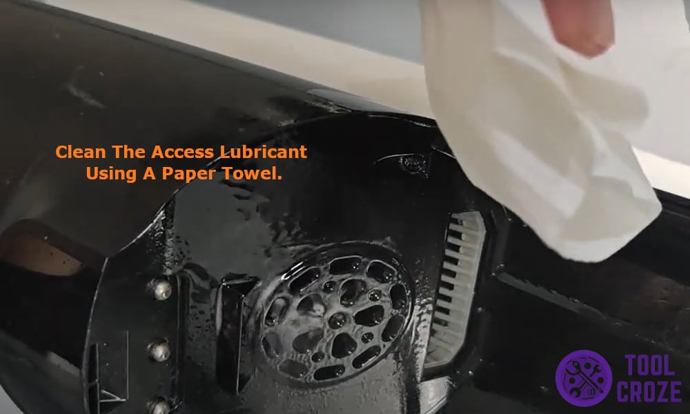 Clean the access lubricant using a paper towel
