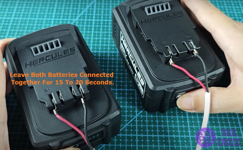Leave both the terminals connected together for 15 to 20 seconds