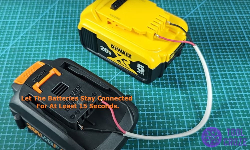Let the batteries stay connected for at least 15 seconds